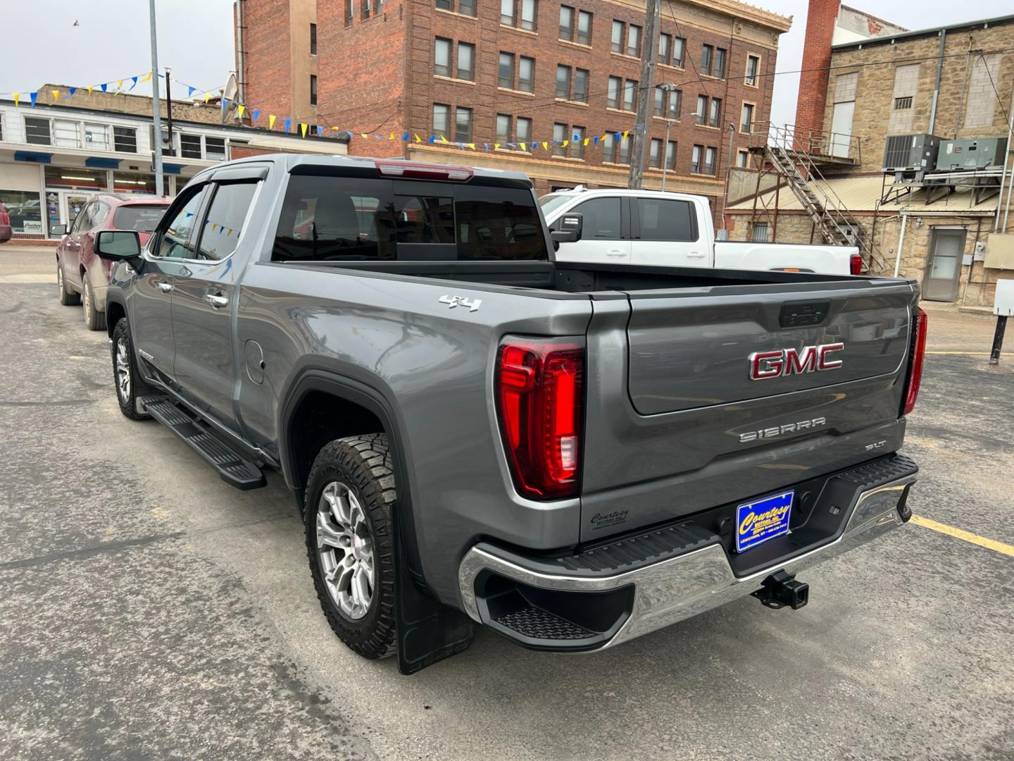 2021 Blue /Blue GMC Sierra 1500 SLT (3GTU9DED7MG) with an 5.3L V8 engine, automatic transmission, located at 116 5th Avenue South, Lewistown, MT, 59457, 47.063877, -109.427879 - Unleash the Power of the Roads with Our Pre-Owned 2021 GMC Sierra 1500 Crew Cab 4WD! Experience the thrill of the open road in this stunning GMC Sierra 1500, a beast on wheels that's ready to conquer any terrain! Don't miss your chance to own this powerful machine - now available in our pre-owned - Photo#4